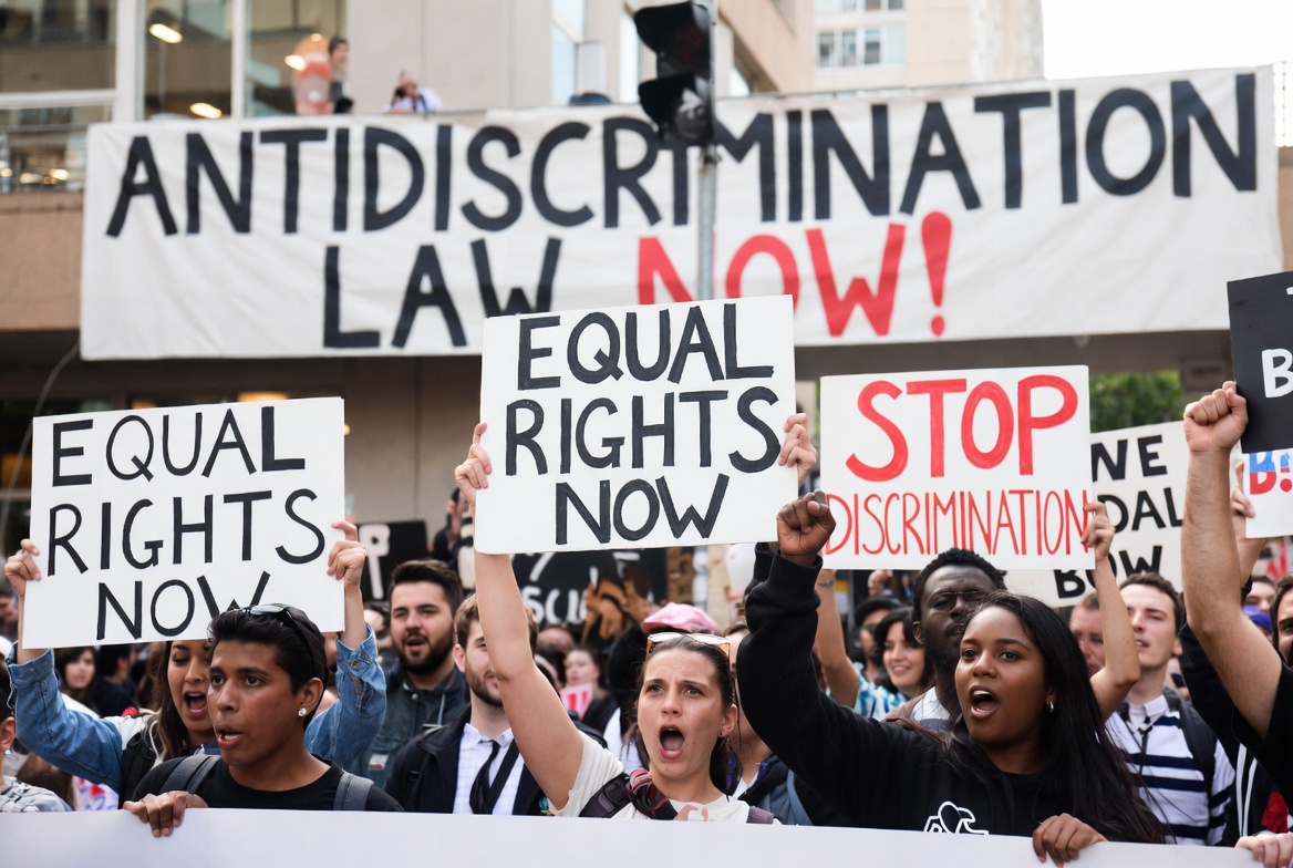 Bold graphic against discrimination in Brazilian human rights law